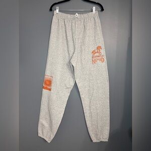 Nomad Gray Sweatpants with Orange Accents
